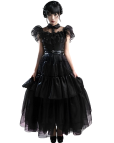Woman wearing a black gothic-style dress on a white background