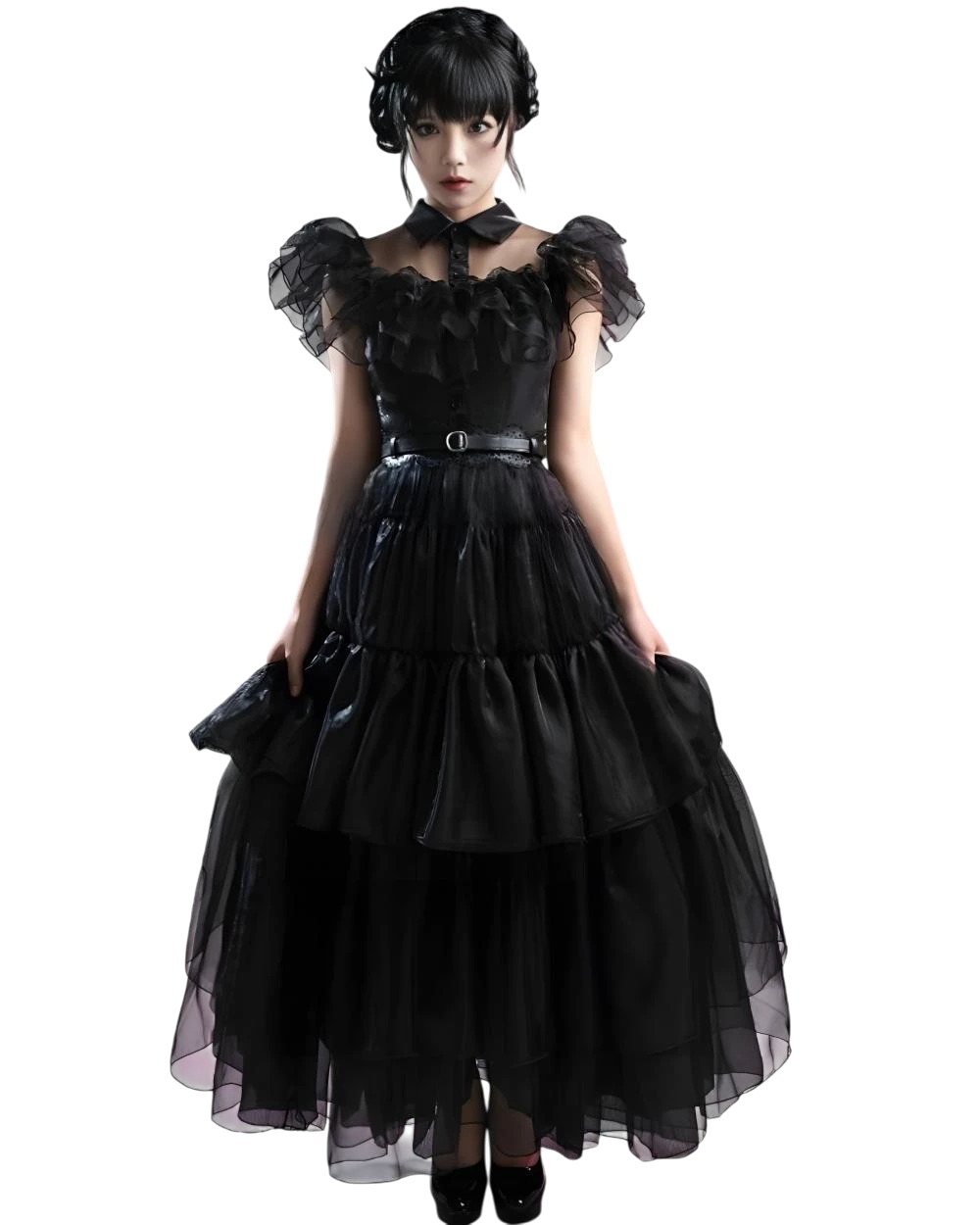 Woman wearing a black gothic-style dress on a white background