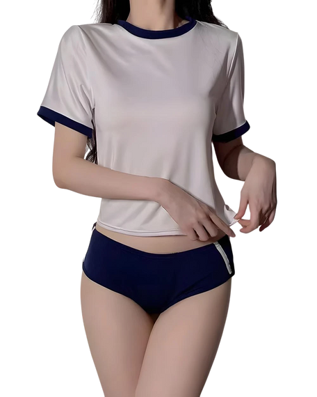 Person wearing a white and navy two-piece outfit on a white background