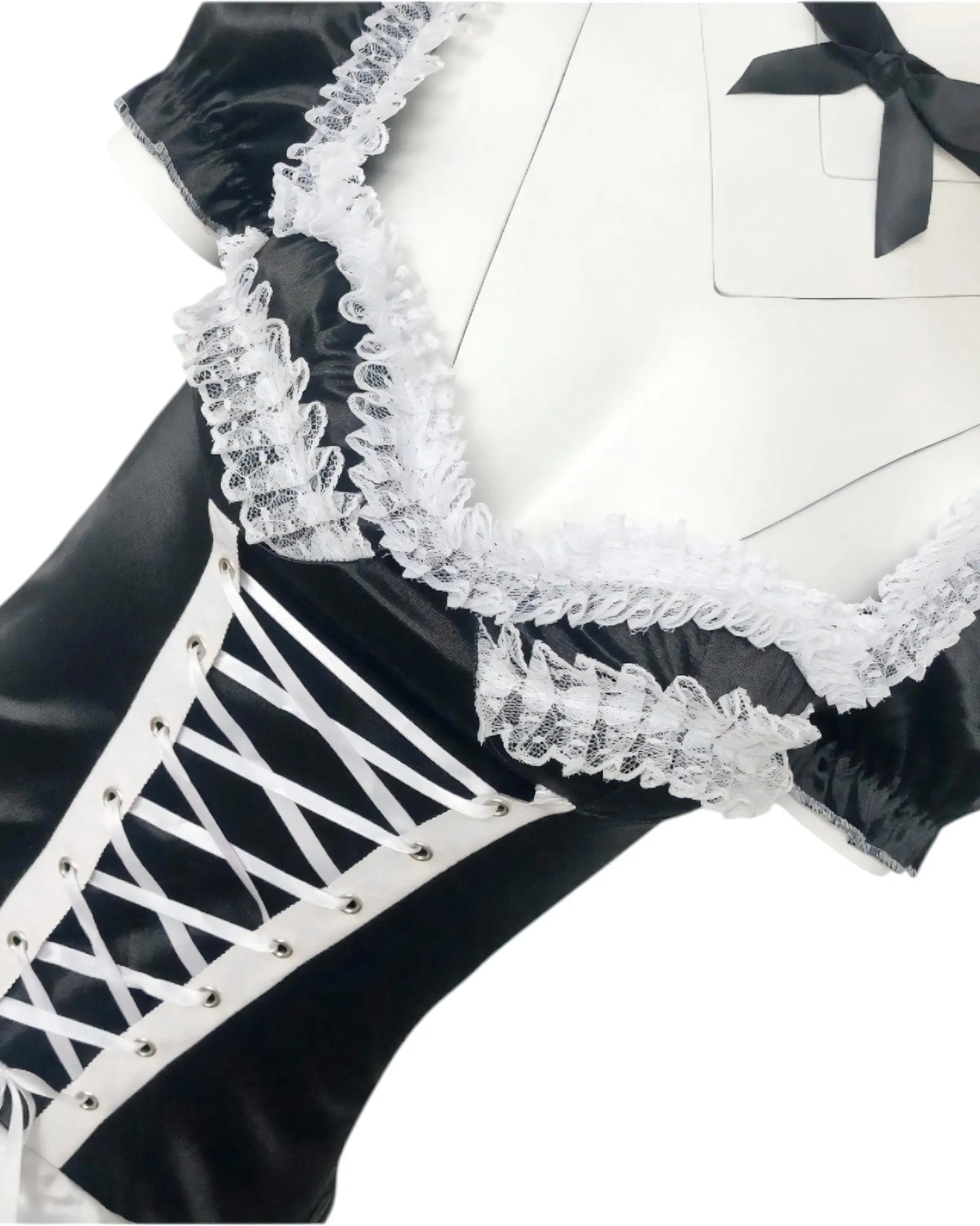 Black and white maid outfit with lace trim and apron, classic French maid costume for cosplay and themed events dress close up