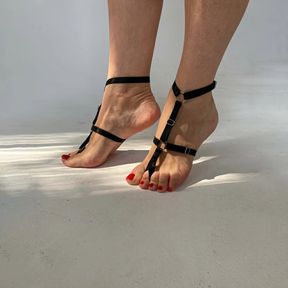 Black elastic strap anklet close-up