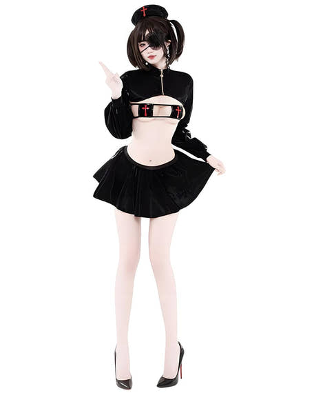 Person wearing a black maid outfit with a skirt and top on a white background