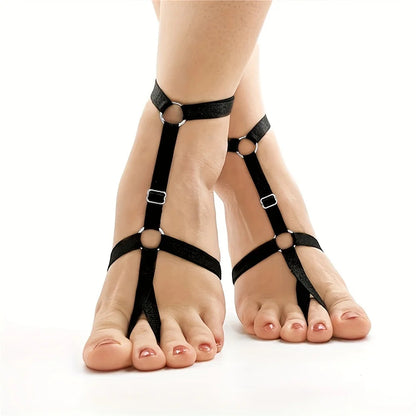 Black minimalist elastic ankle chain on a beach-ready outfit