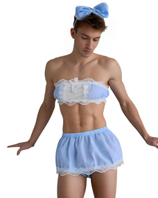 A man modeling a light blue and white lingerie set consisting of a strapless bandeau top with lace trim and matching sheer shorts, along with a light blue bow headband, against a plain white background.