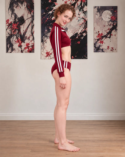 Side view of the burgundy athletic cosplay uniform with striped sleeves.
