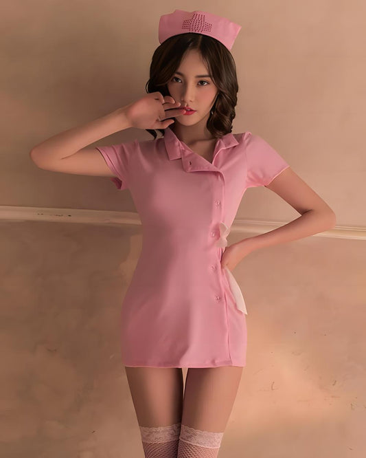 Person wearing a pink nurse outfit with a matching hat against a beige background
