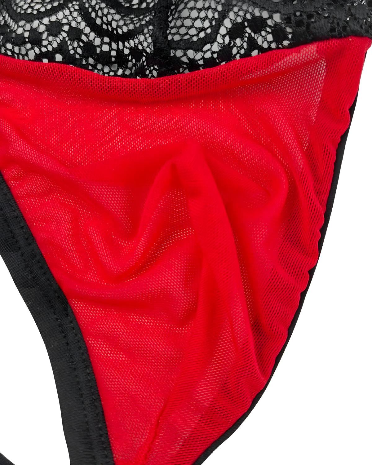 Close-up of a red mesh thong with black trim and a black lace waistband, shown against a white background.
