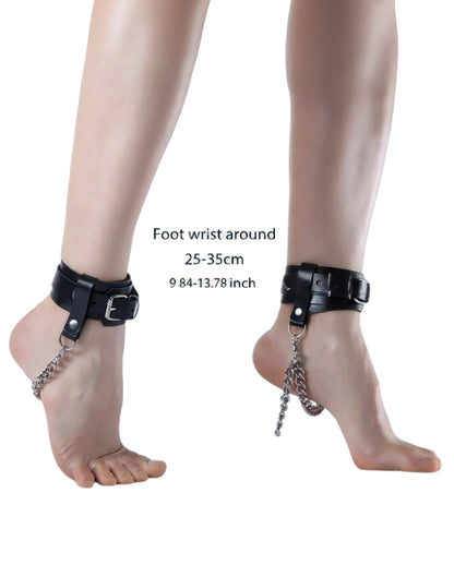 Black ankle cuffs with attached silver chains worn on a person's feet, shown against a white background with overlaid sizing text reading 'Foot wrist around 25-35cm 9 84-13.78 inch'.
