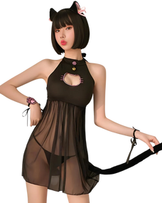 Woman wearing a black cat-themed dress with a white background