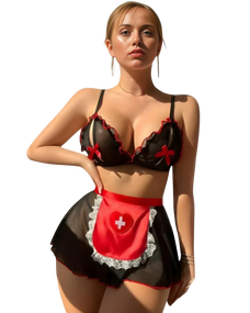 Woman wearing a black and red lingerie set with a heart design on a white background