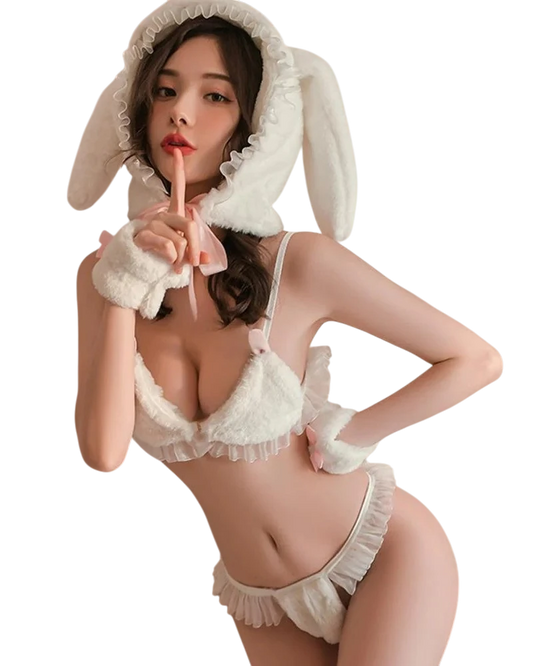 Person wearing a bunny costume with a white background