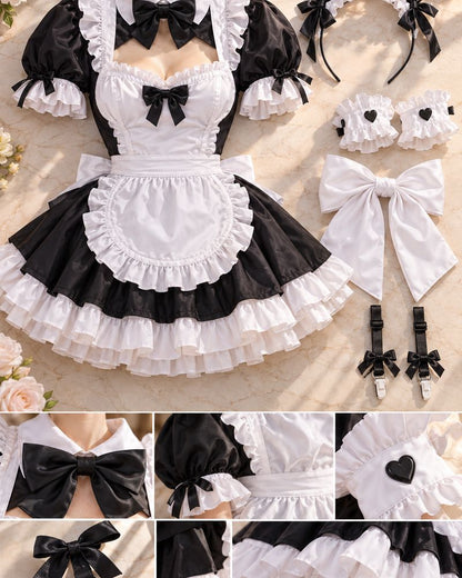 Black and white Rabbit Hole inspired maid cosplay dress and coordinated accessories arranged as a flat lay.