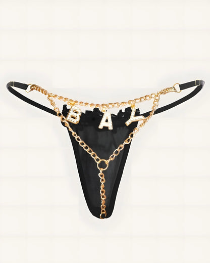 Sexy mesh thong with rhinestone "BAY" detail and gold chain accents back