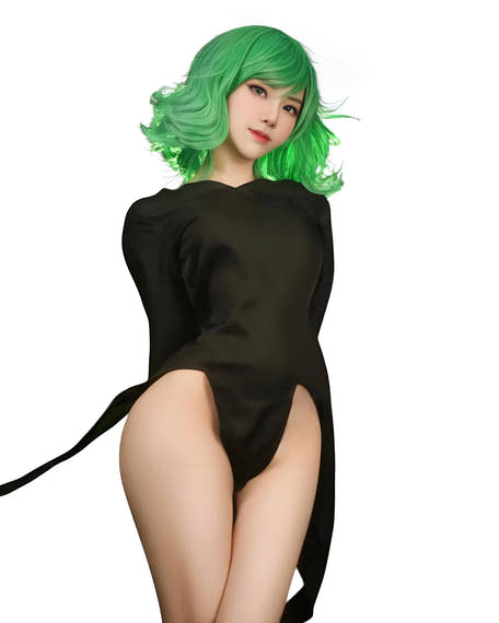 Tatsumaki cosplay from One Punch Man featuring her black dress and green hair. close up