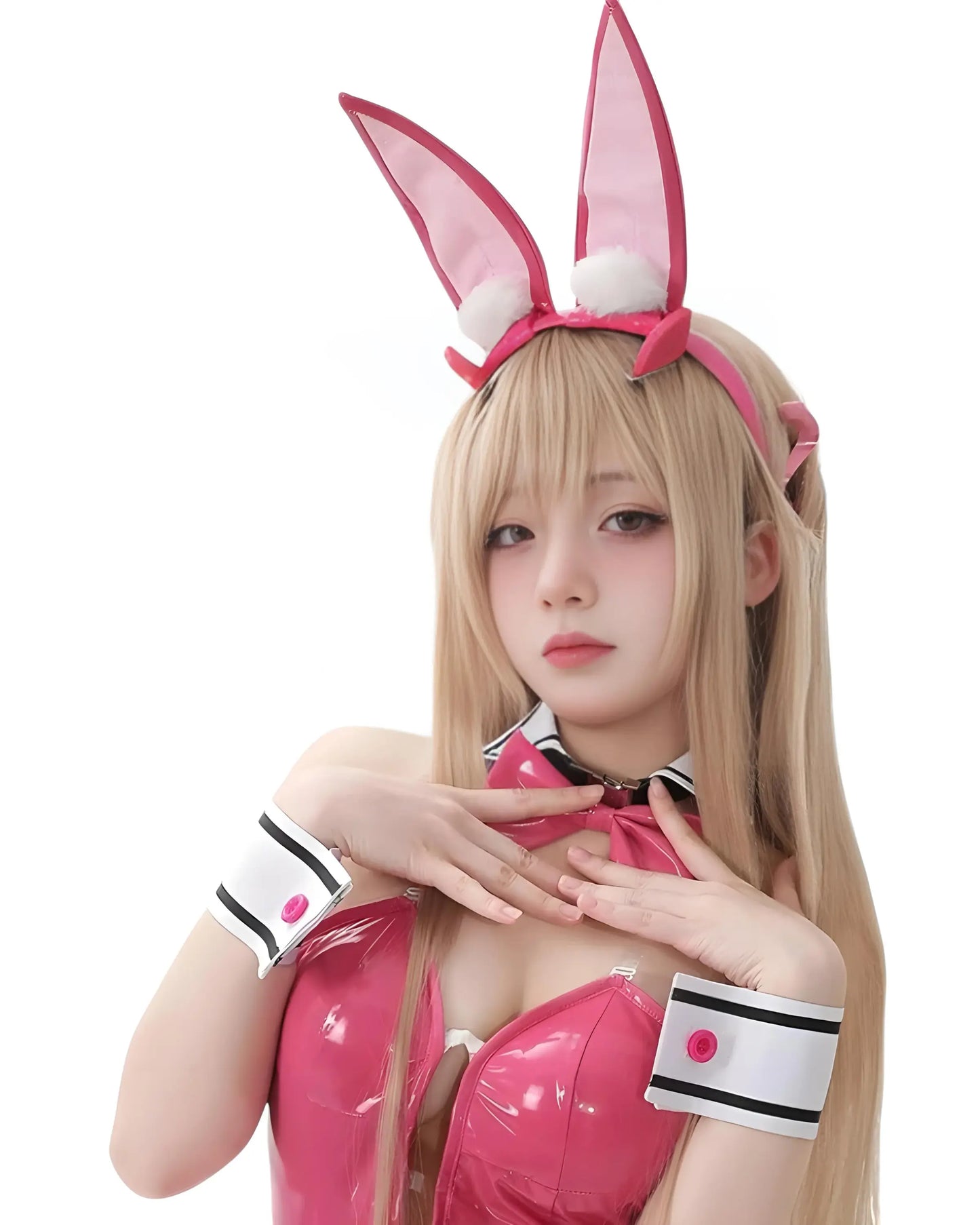 Cosplayer in pink Viper Bunny Suit cosplay from Nikke: Goddess of Victory in Noir, Blanc & Pink editions close up 2