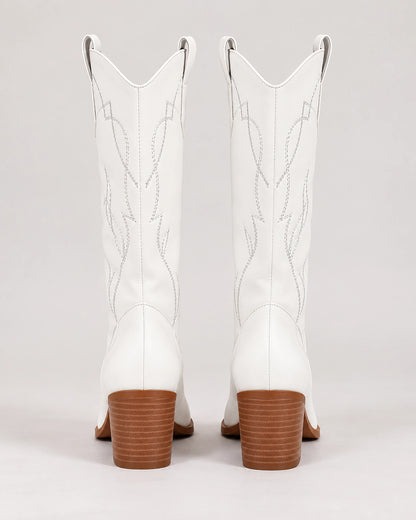 Rear view of white mid-calf Western boots with brown stacked heels