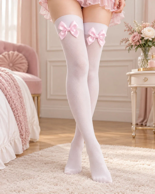 White thigh-high stockings with smooth plain upper band and pink satin bows; no lace